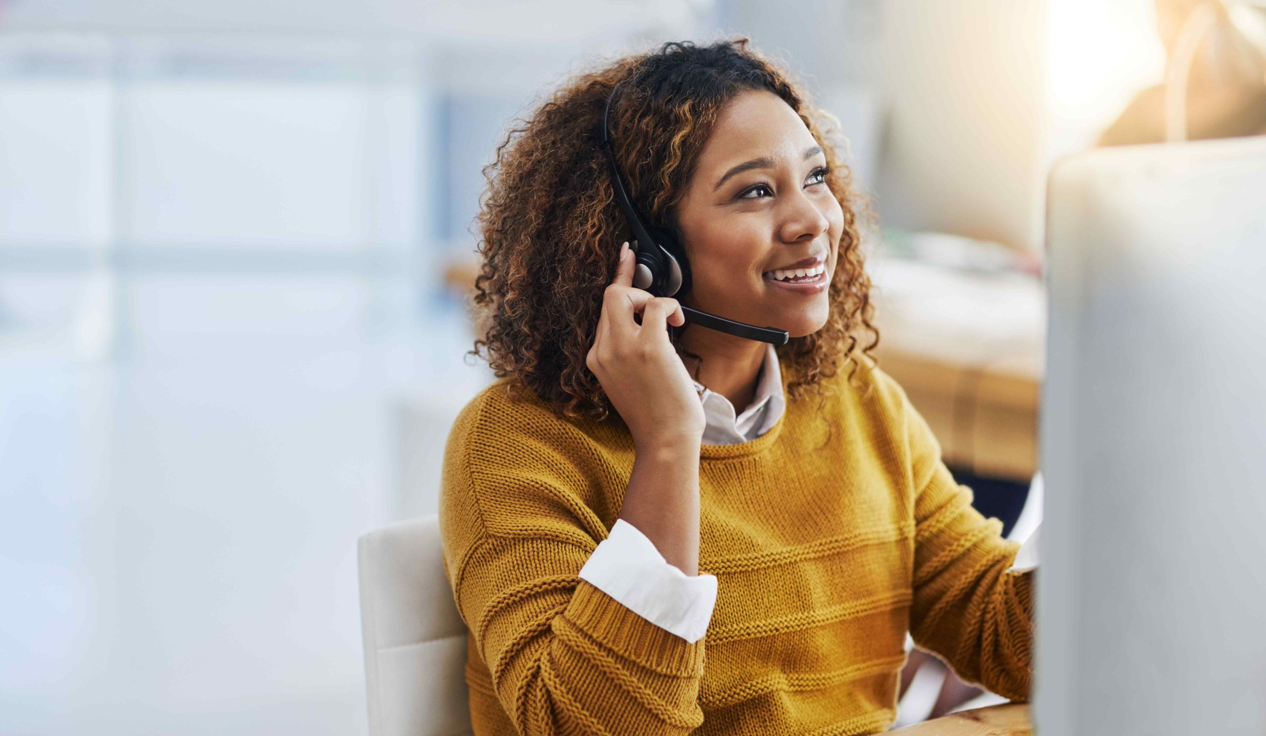 women with a microphone while telesales